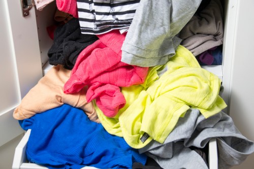 Workers wearing PPE during waste removal